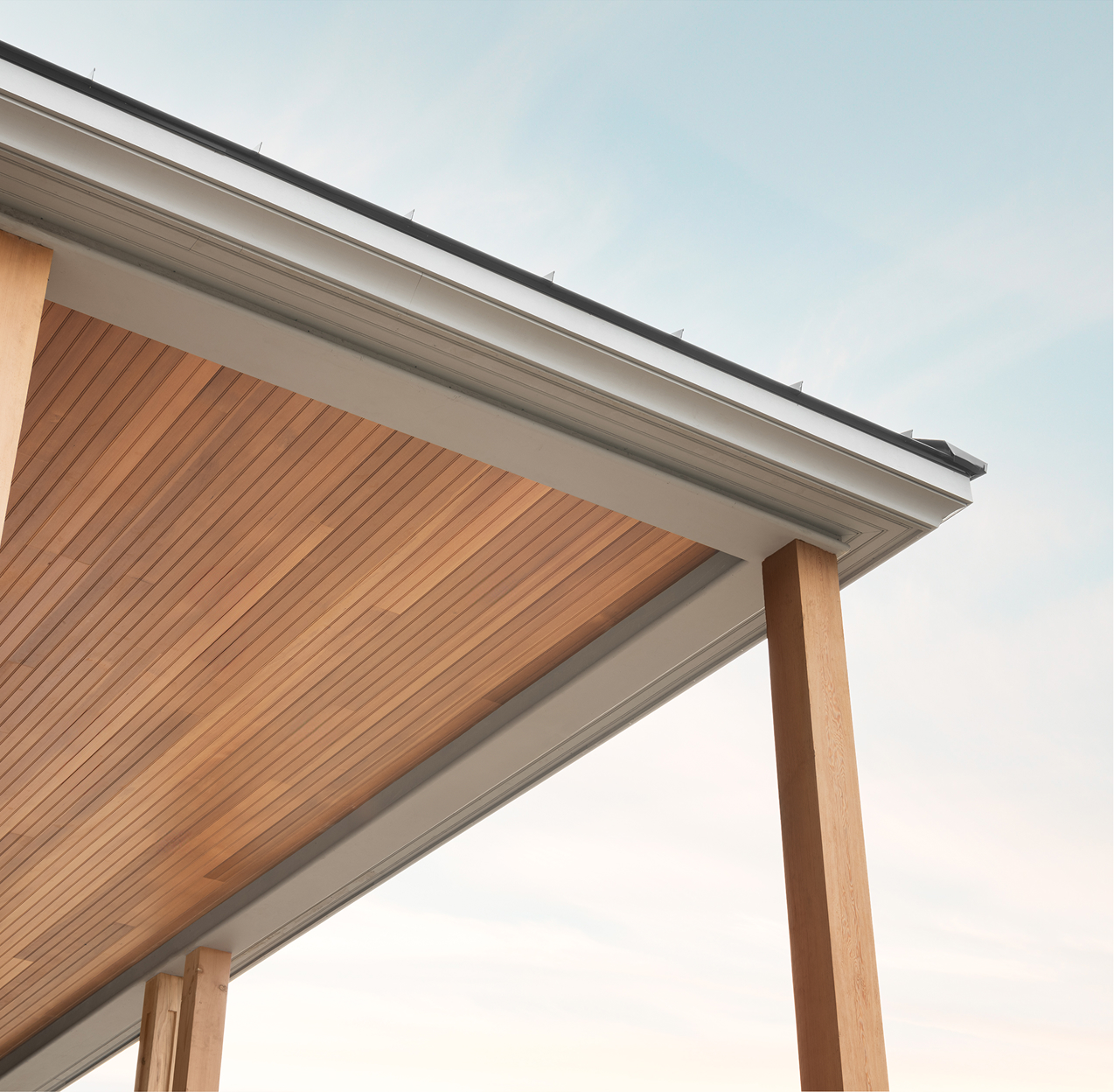 Image of a porch ceiling at a Lake Sunapee, NH home that features Timber Trading ICON® Douglas Fir