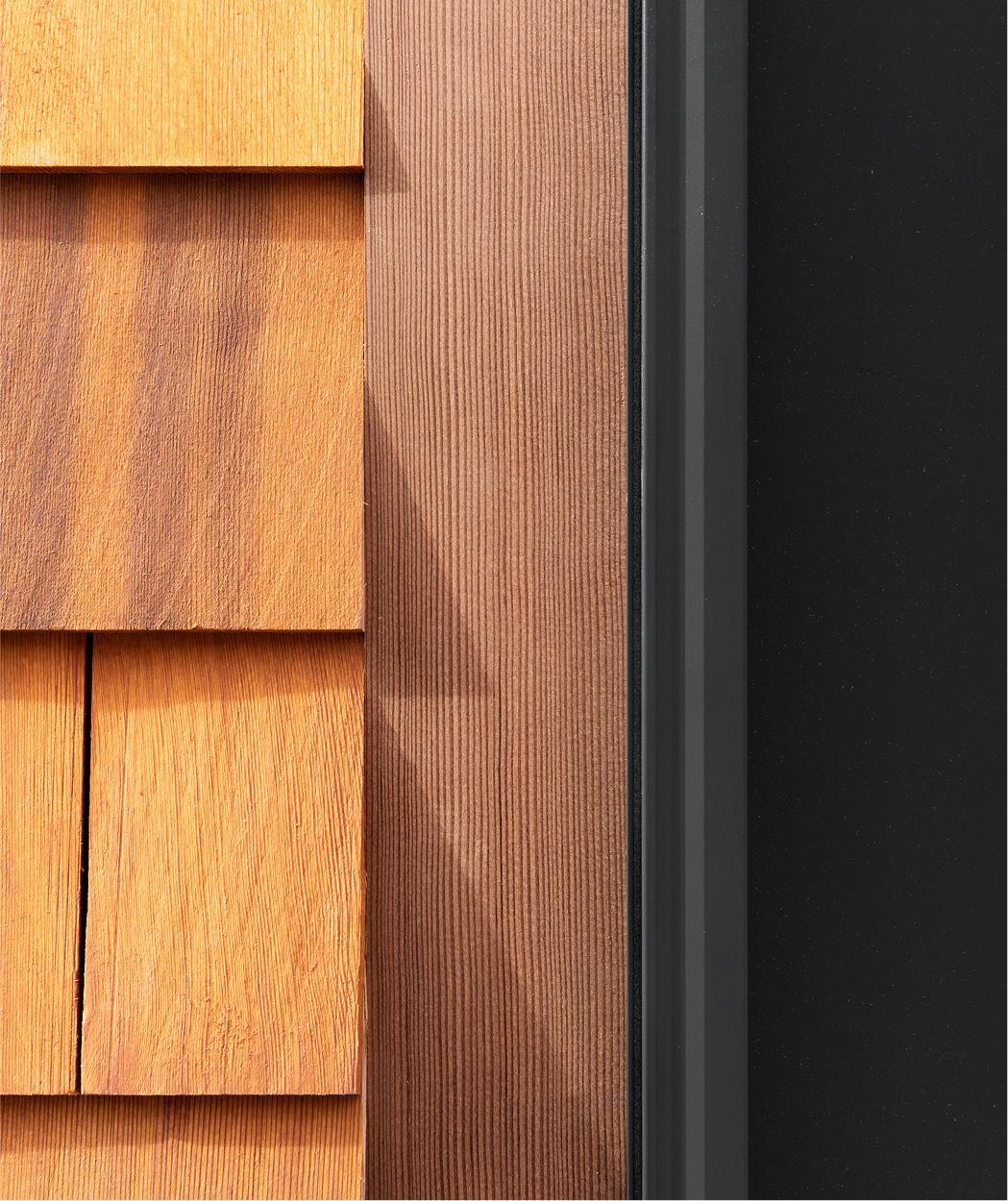 Close-up of ICON Douglas Fir trim alongside cedar shingles