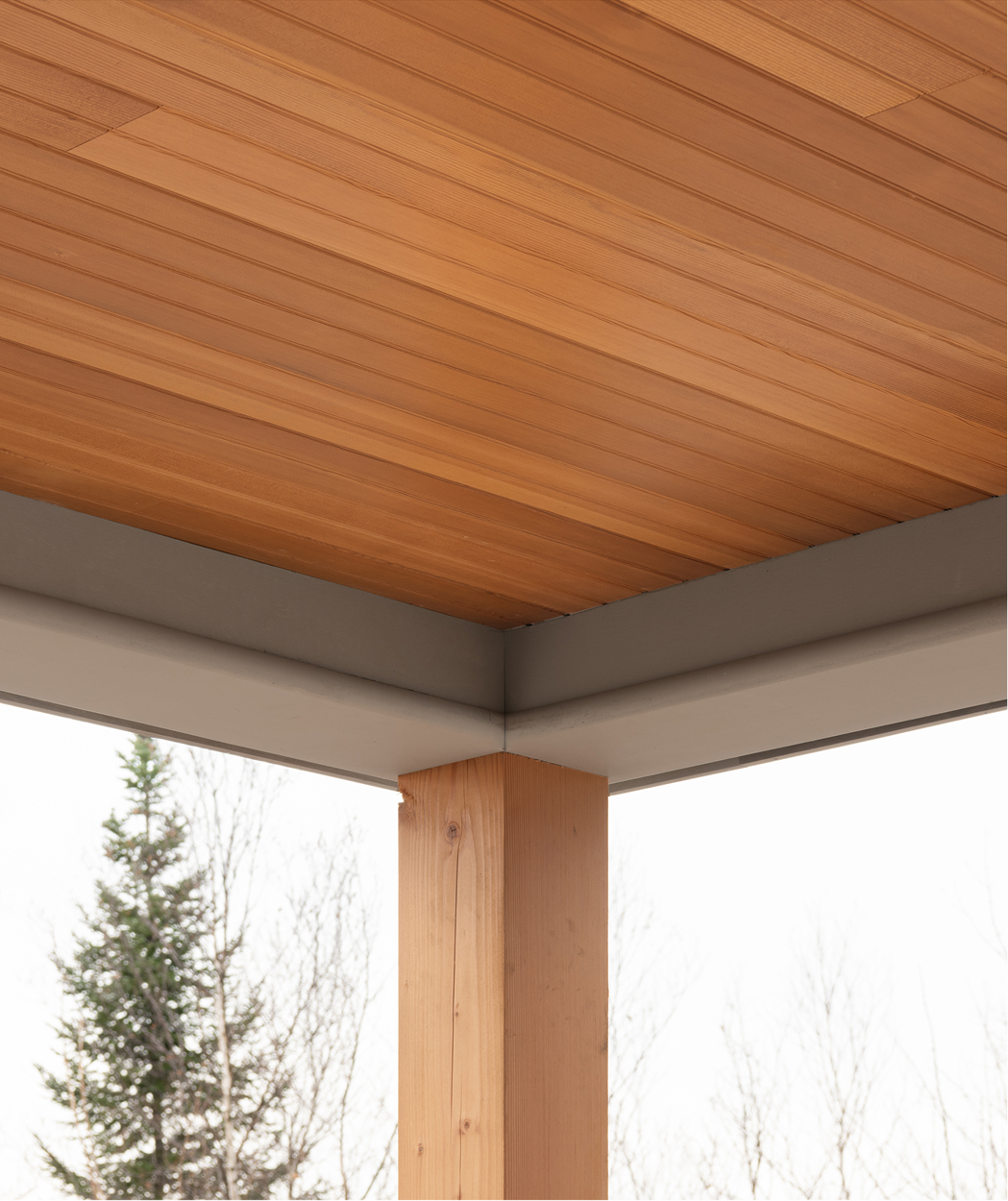 Close up image of a porch ceiling at a Lake Sunapee, NH home that features Timber Trading ICON® Douglas Fir