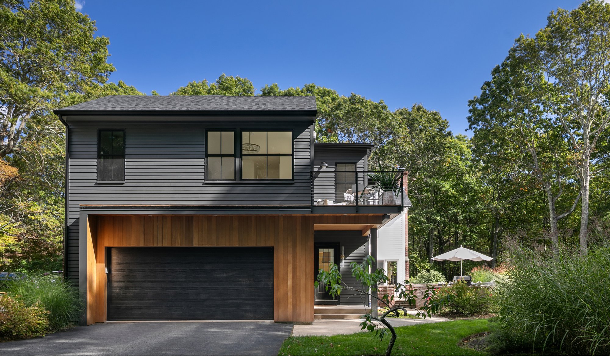 Front exterior shot of a home in West Greenwich, RI featuring Timber Trading ICON Douglas Fir