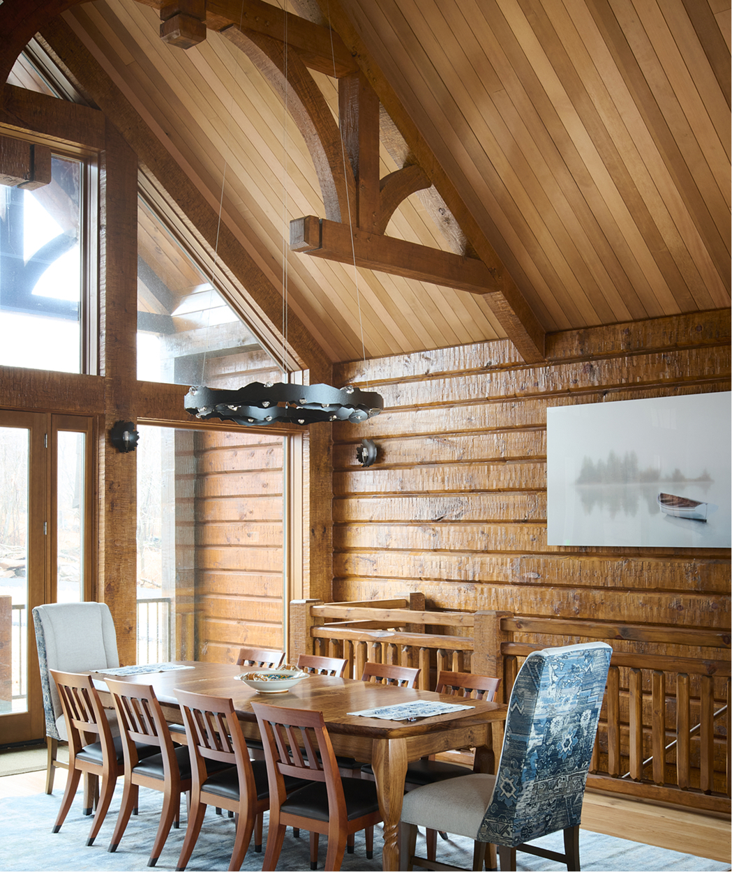 Photo of cathedral ceilings in a dining room featuring Timber Trading wood.
