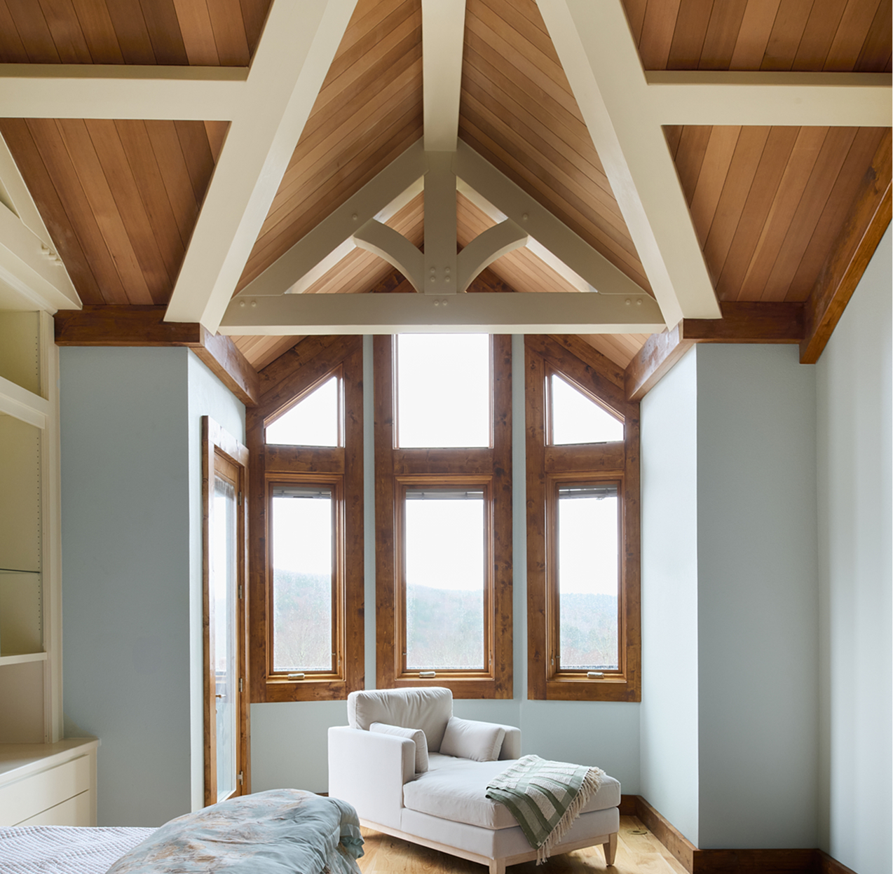 Photo of cathedral ceilings in a bedroom featuring ICON