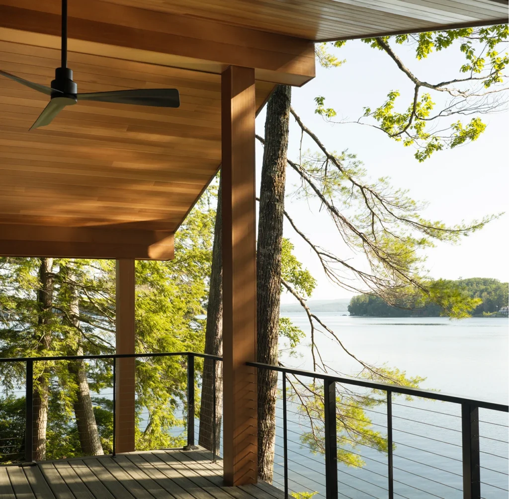 Image of porch ceiling, soffit, and wrapped beams on a modern home facing towards Little Lake Sunapee, NH